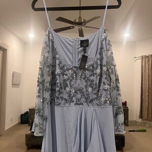 Adrianna Papell light bluish gray maxi dress with beaded work on bodice.